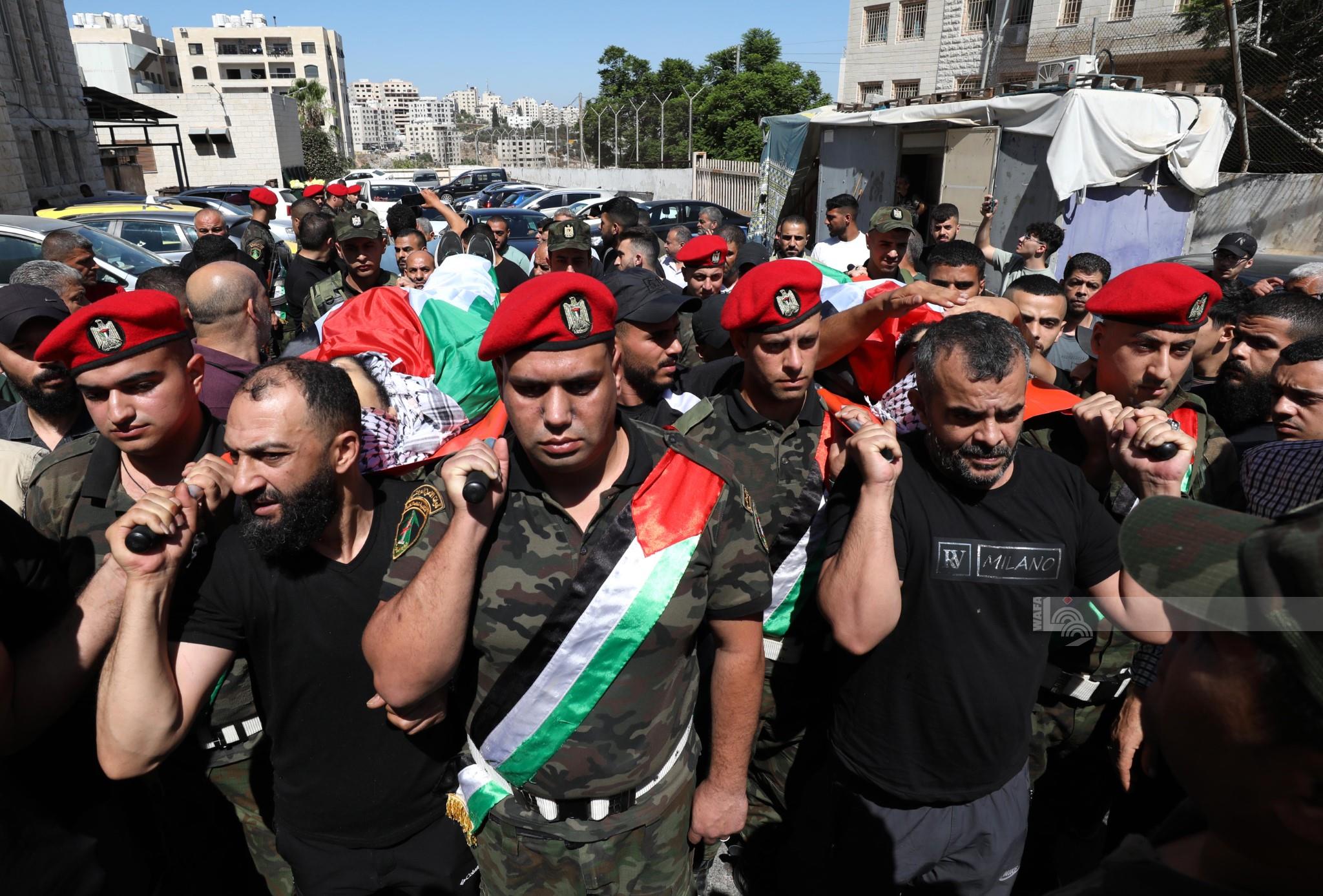 جانب من تشييع جثماني الشهيدين (تصوير: أيمن نوباني)